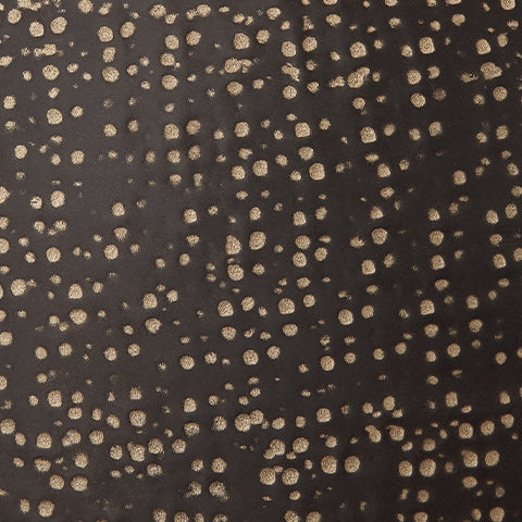 Close detail of Hambell lamp finish showing black and gold tones