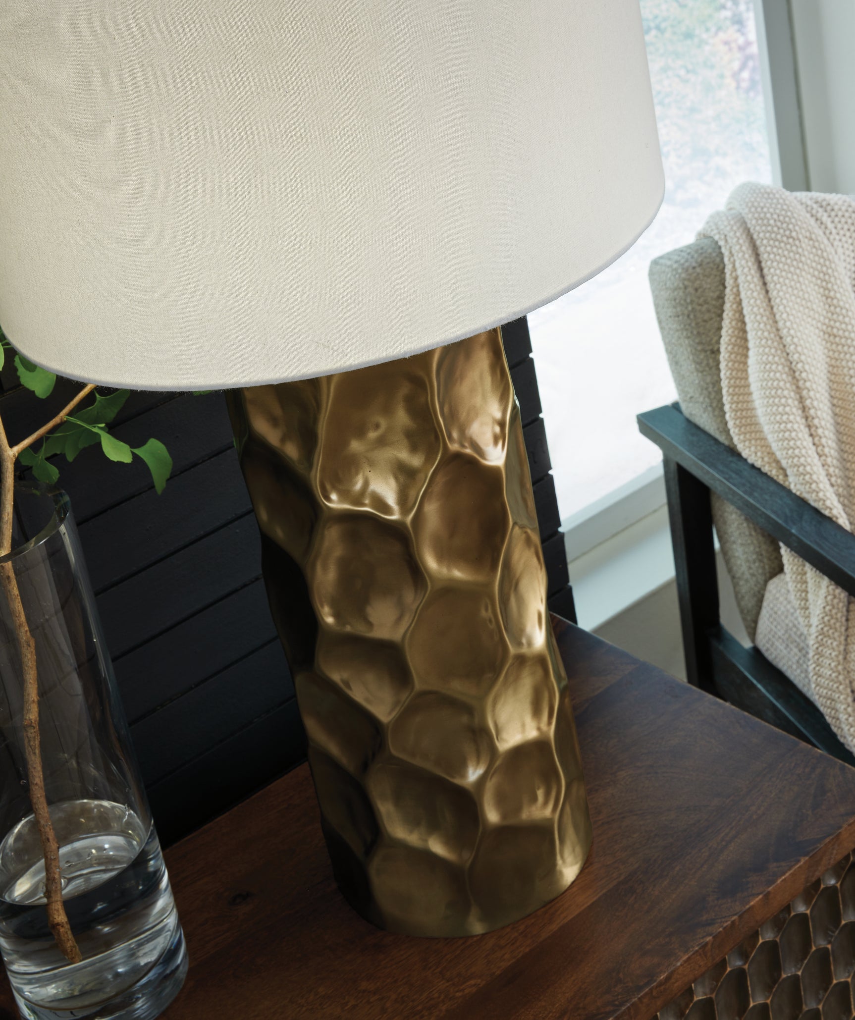 Detail view of Marshawn gold finish metal base