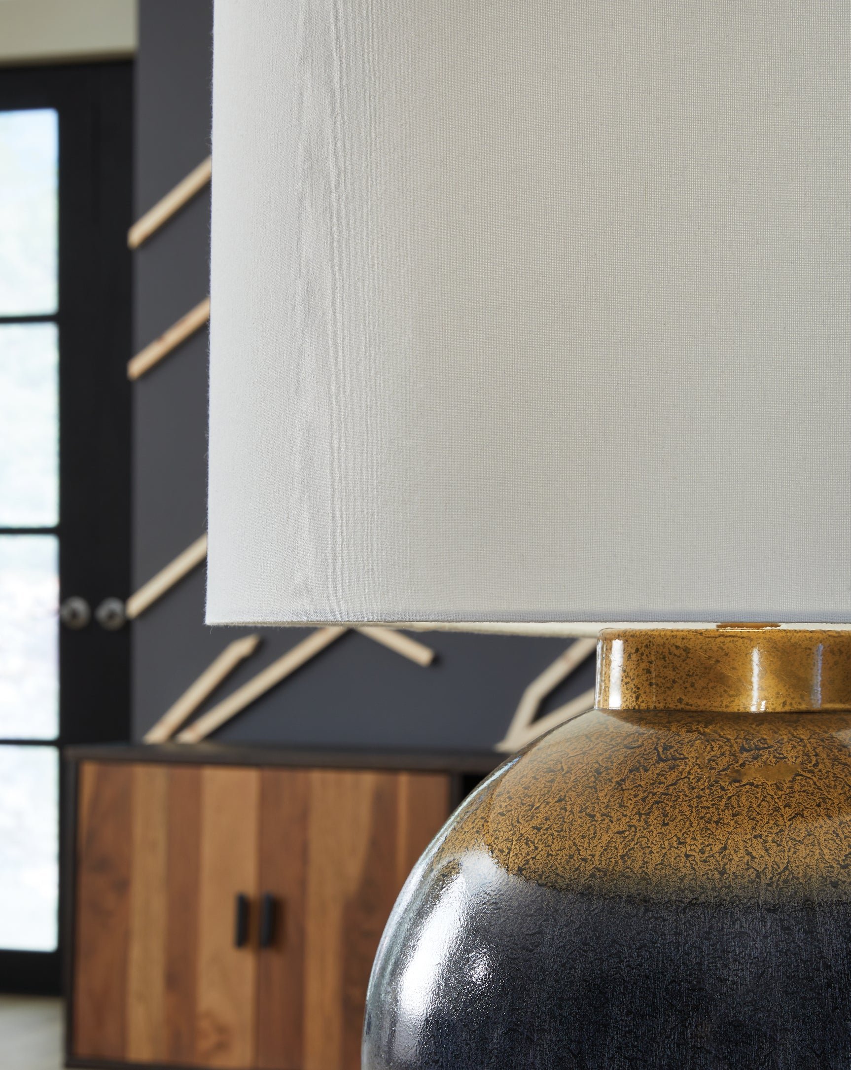 Close-up of Adara lamp's fabric drum shade
