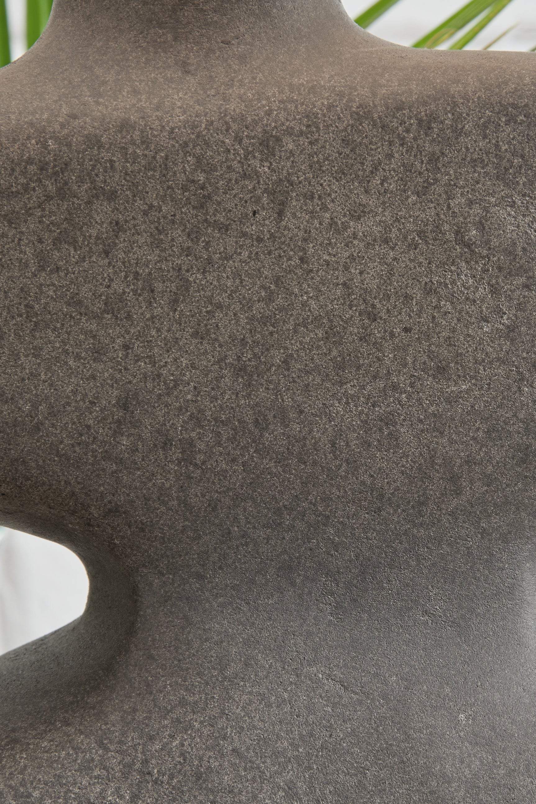 Close-up of distressed black finish on lamp base