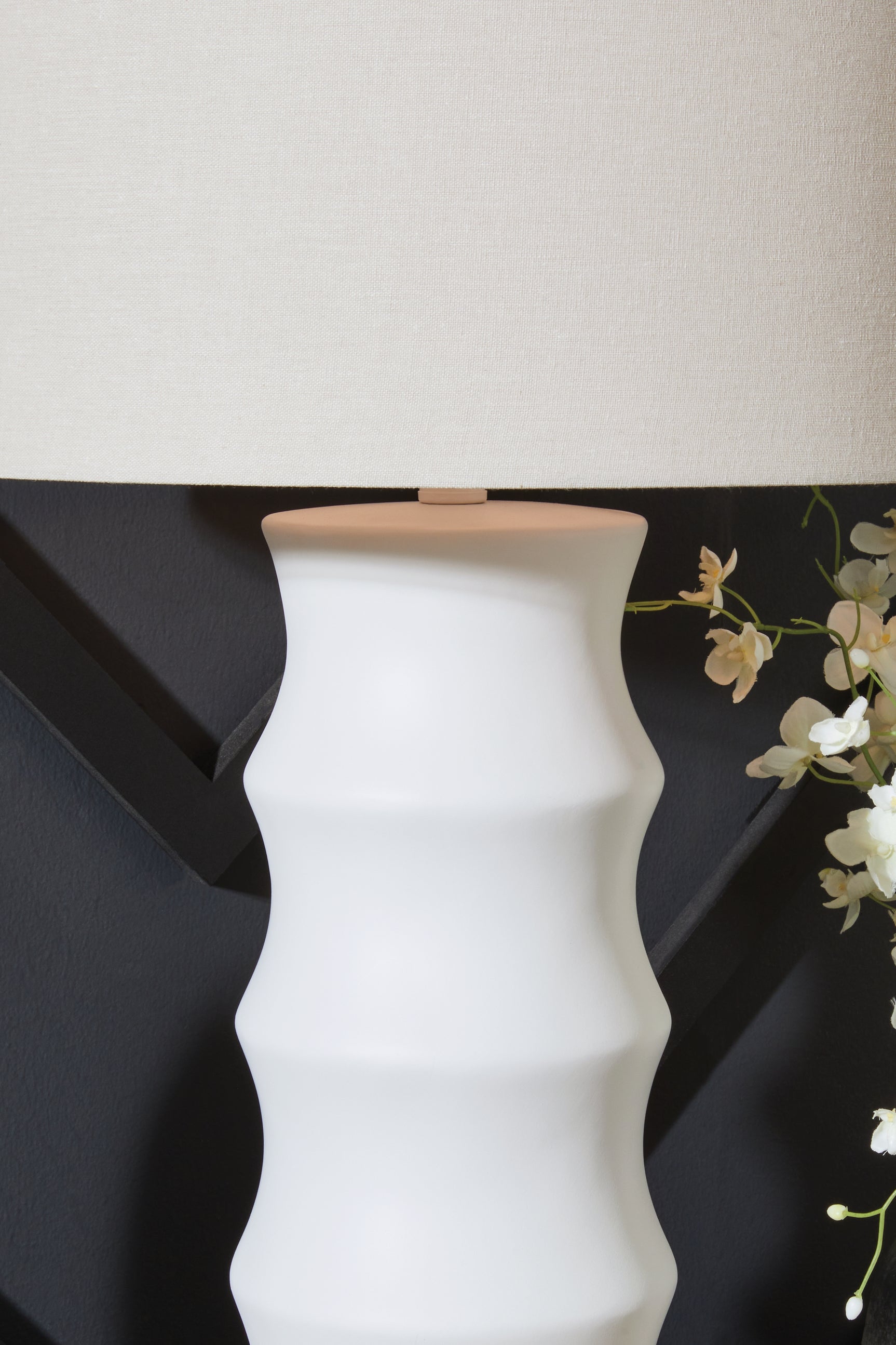 Detail of white fabric drum shade on Veraleigh lamp