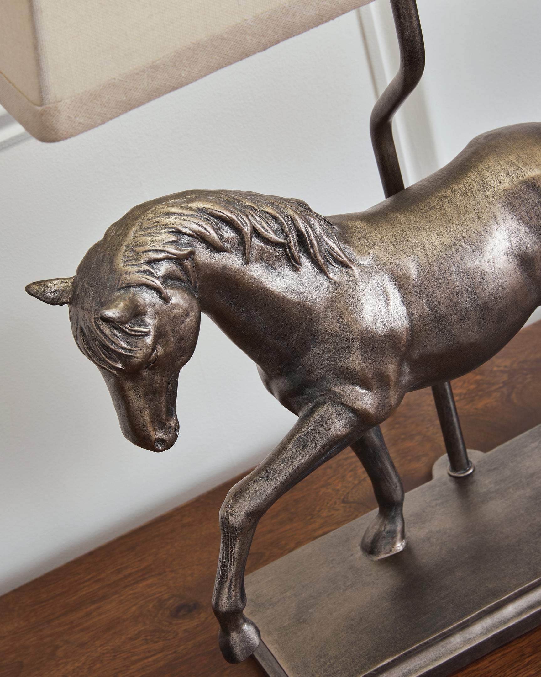 Textured bronze finish detail on Sandorman table lamp base