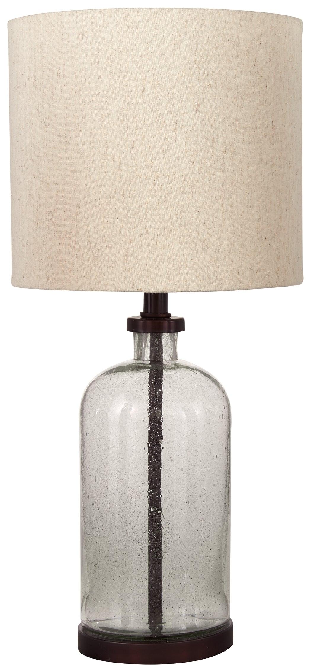 Side view of Bandile bronze finish table lamp with fabric drum shade