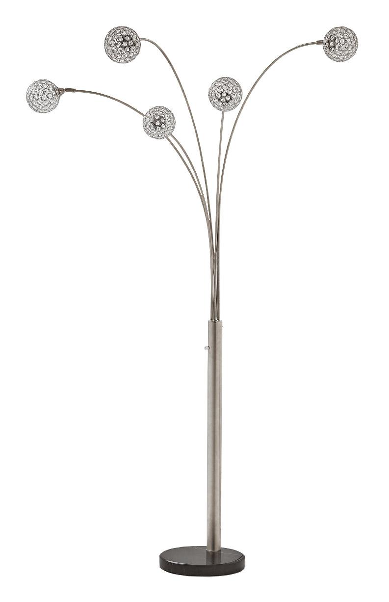 Winter Silver Finish Arc Lamp illuminated in room setting