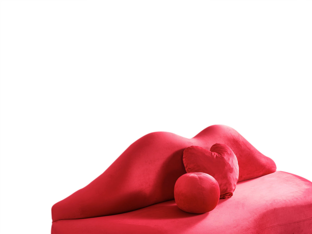 Side view of Audrey Red Velvet Loveseat showing armrest
