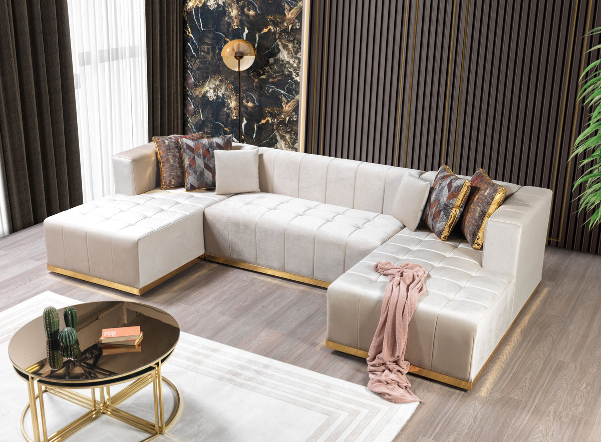 Close-up of ivory velvet upholstery and wood frame on sectional sofa