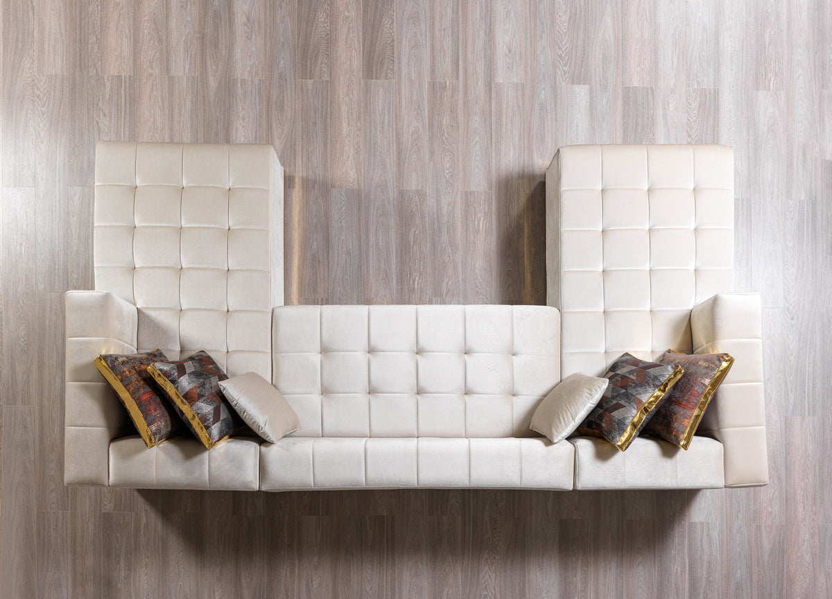 Side view showing shape and velvet finish of sectional sofa