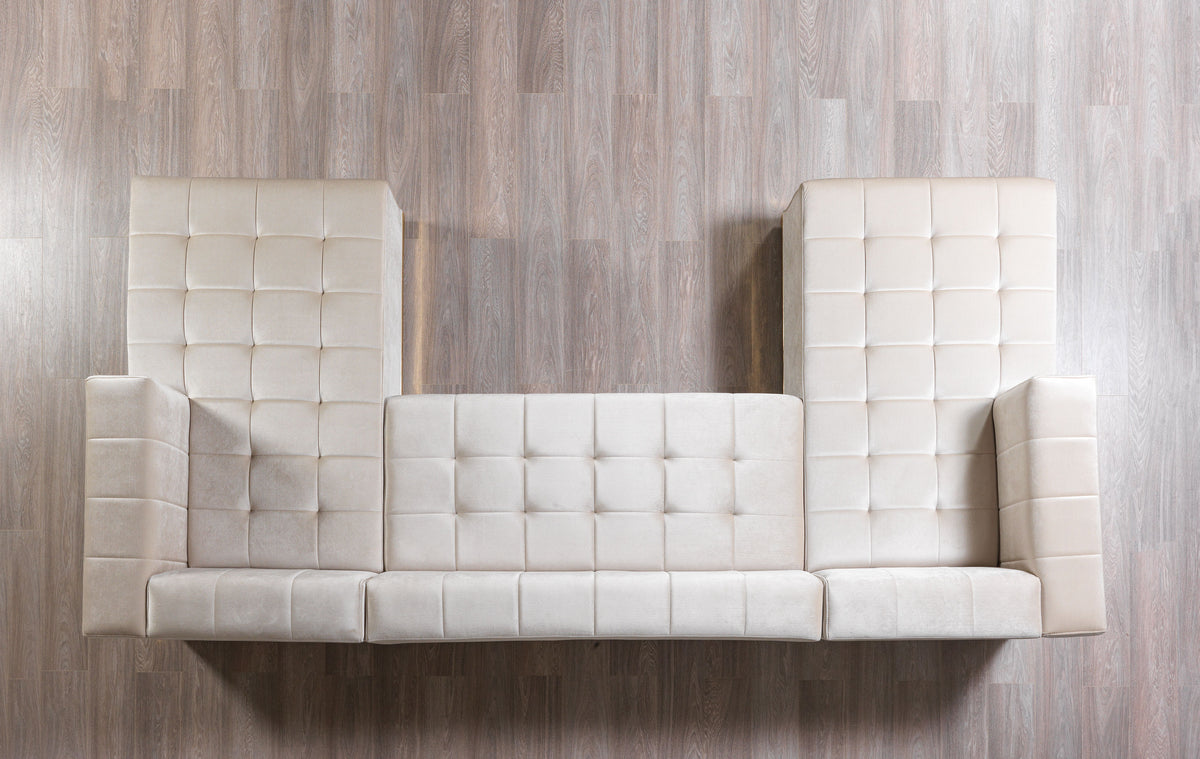 Detail view highlighting velvet fabric texture on sectional sofa