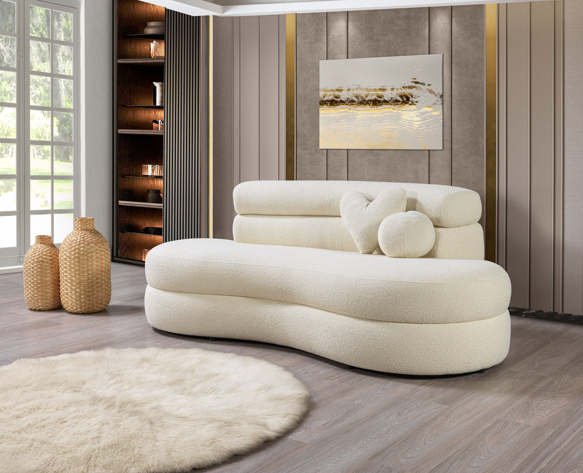 Close-up of ivory boucle fabric texture on loveseat