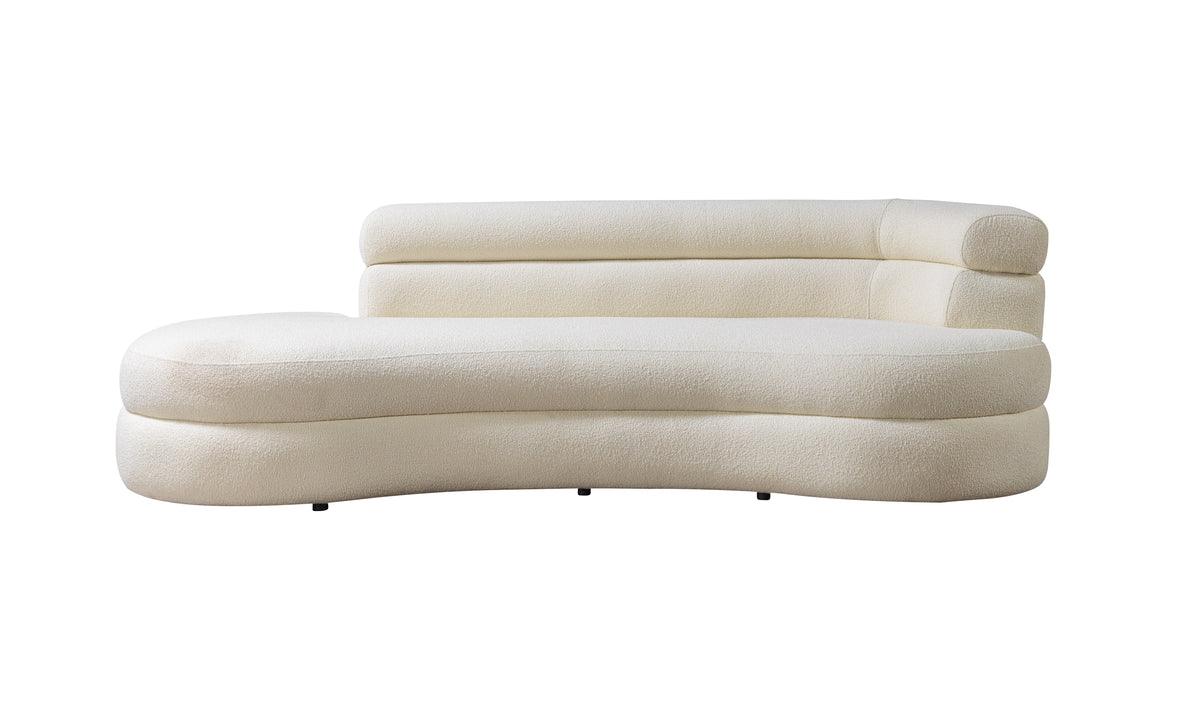 Front view of chaise lounge showing ivory boucle fabric