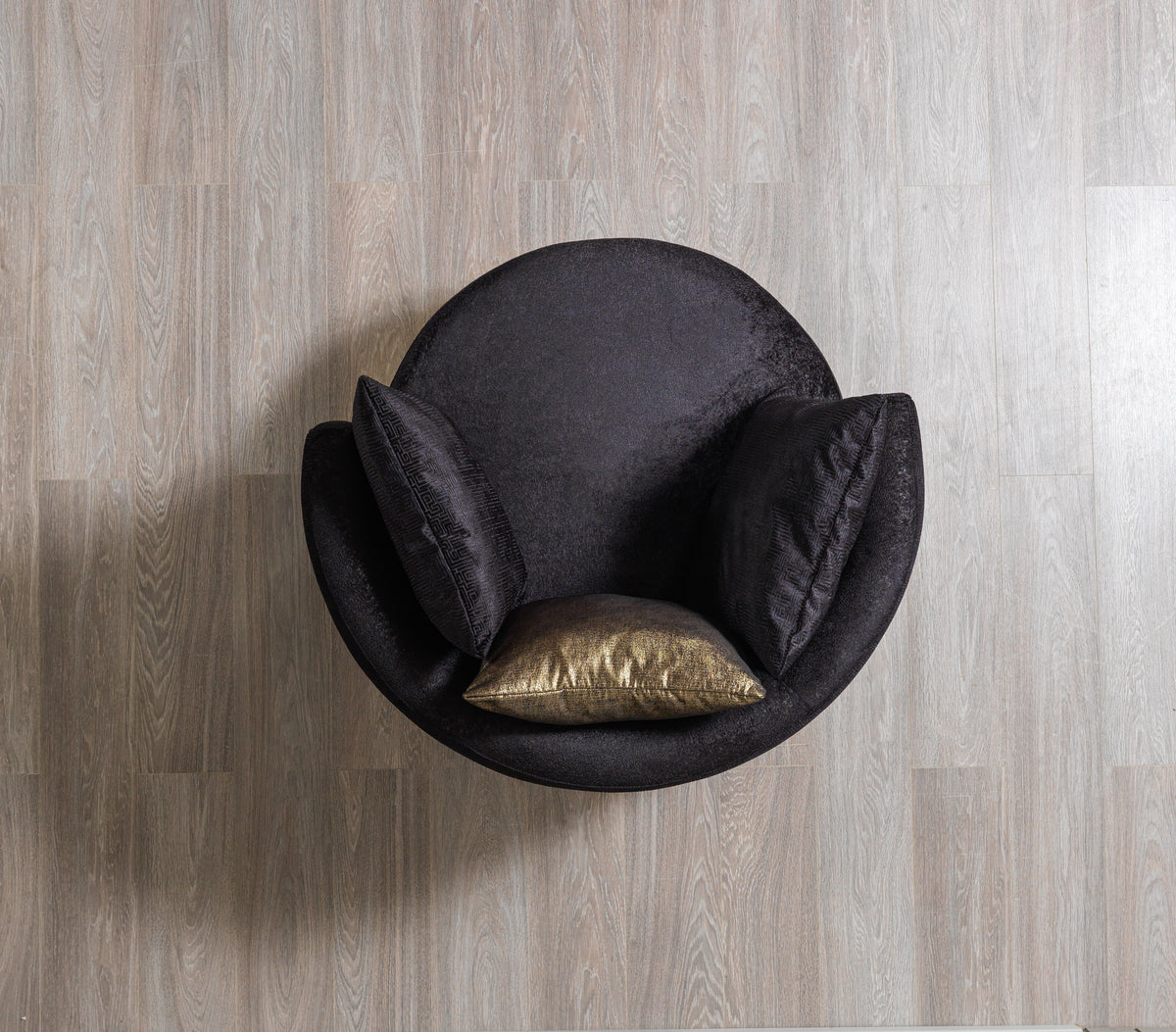 Detail shot of plush velvet cushions on sofa