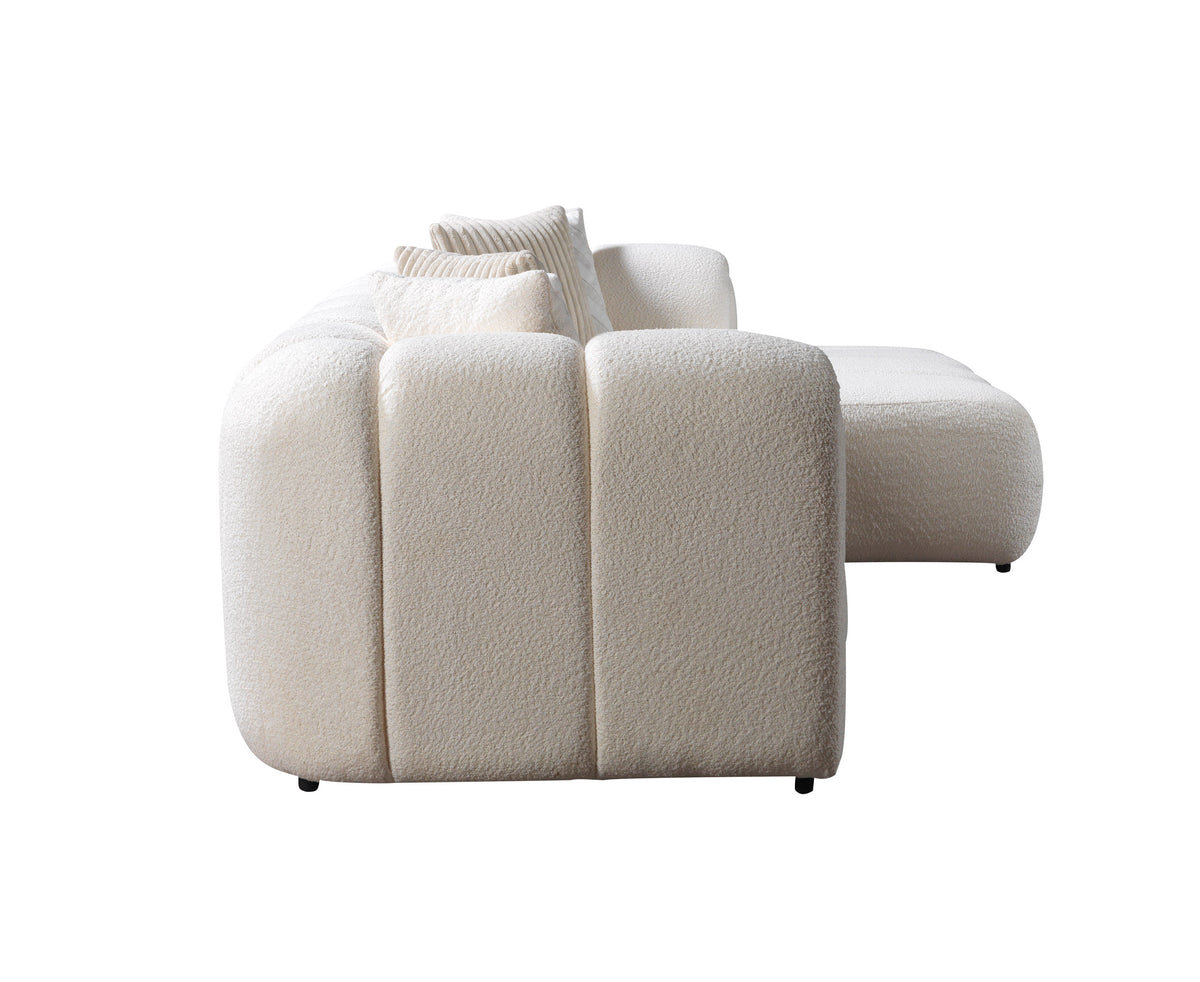 Room angle showing entire Elly Ivory Boucle Sectional