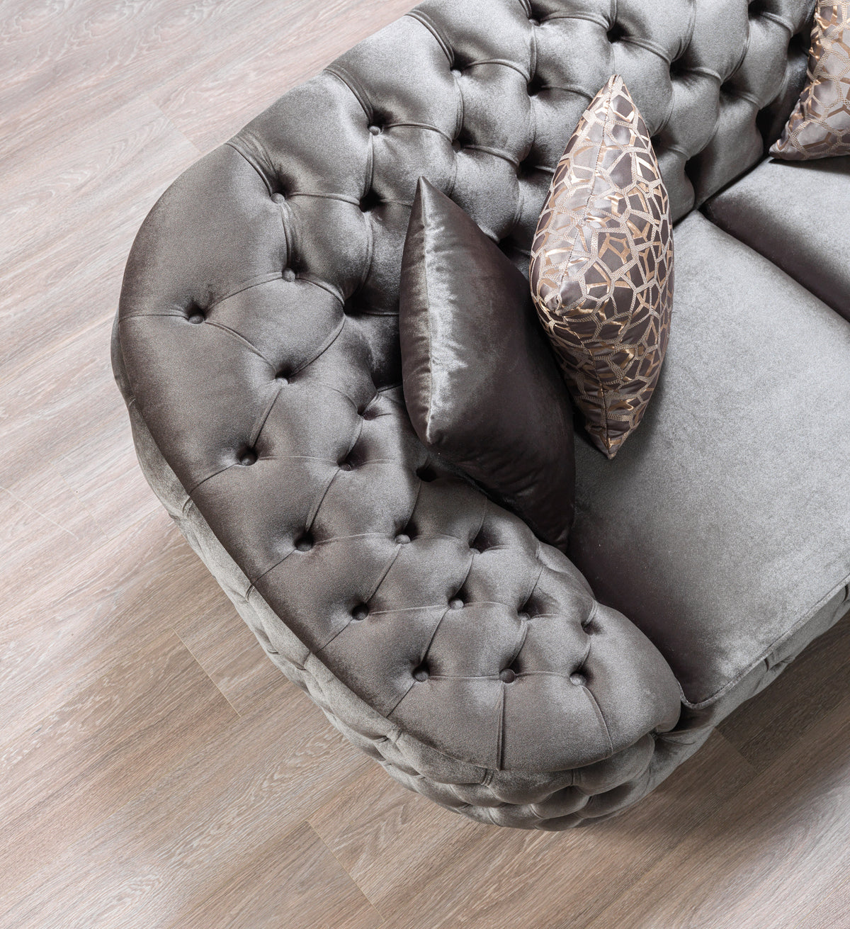 close detail of sofa arm and velvet texture