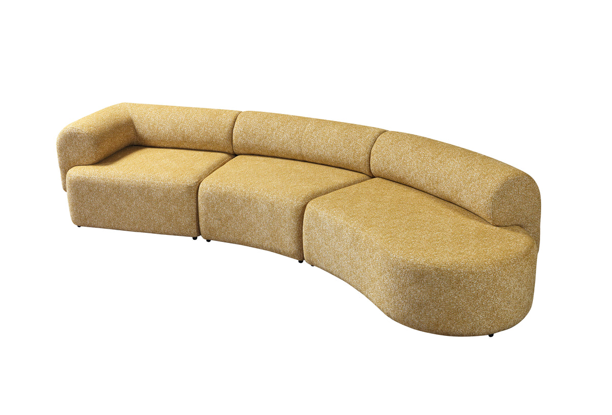 Room styled with mustard curved sectional