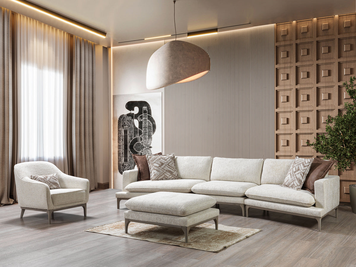 Side angle showing curved design of Alexis Ivory Linen sectional sofa