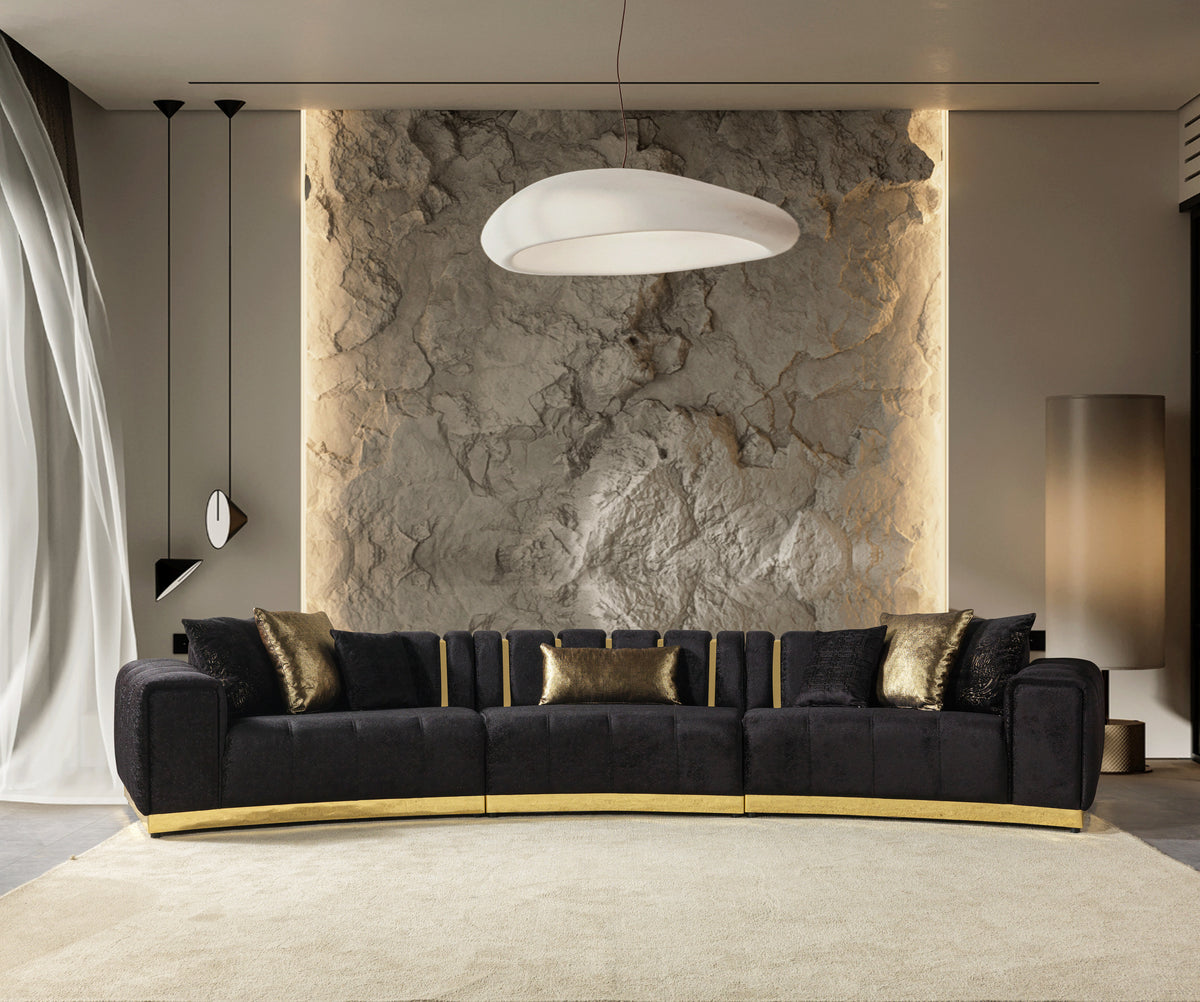 Living room setting with Anne Black Velvet Curved Sectional Sofa