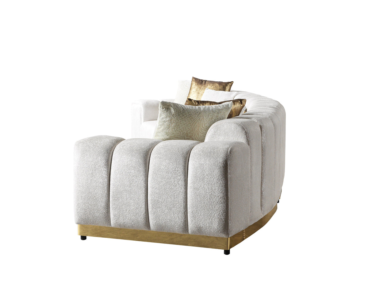 Side perspective highlighting the sectional's elegant form