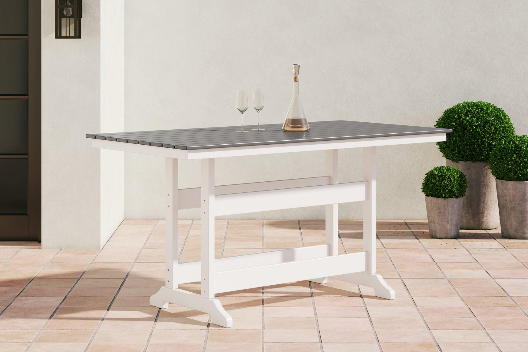 Top view of Transville gray and white outdoor counter height dining table