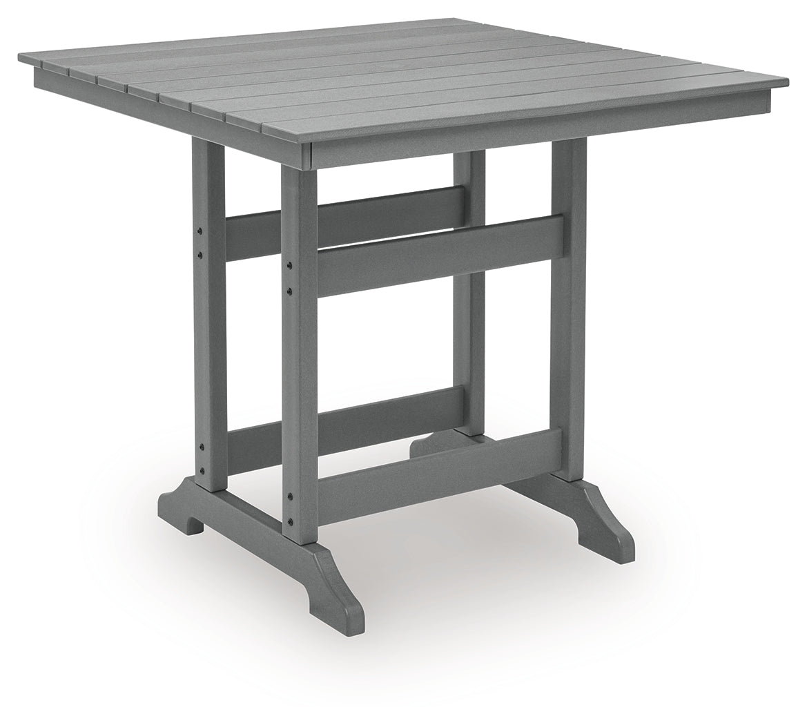 Angle view of outdoor dining table showcasing slatted design
