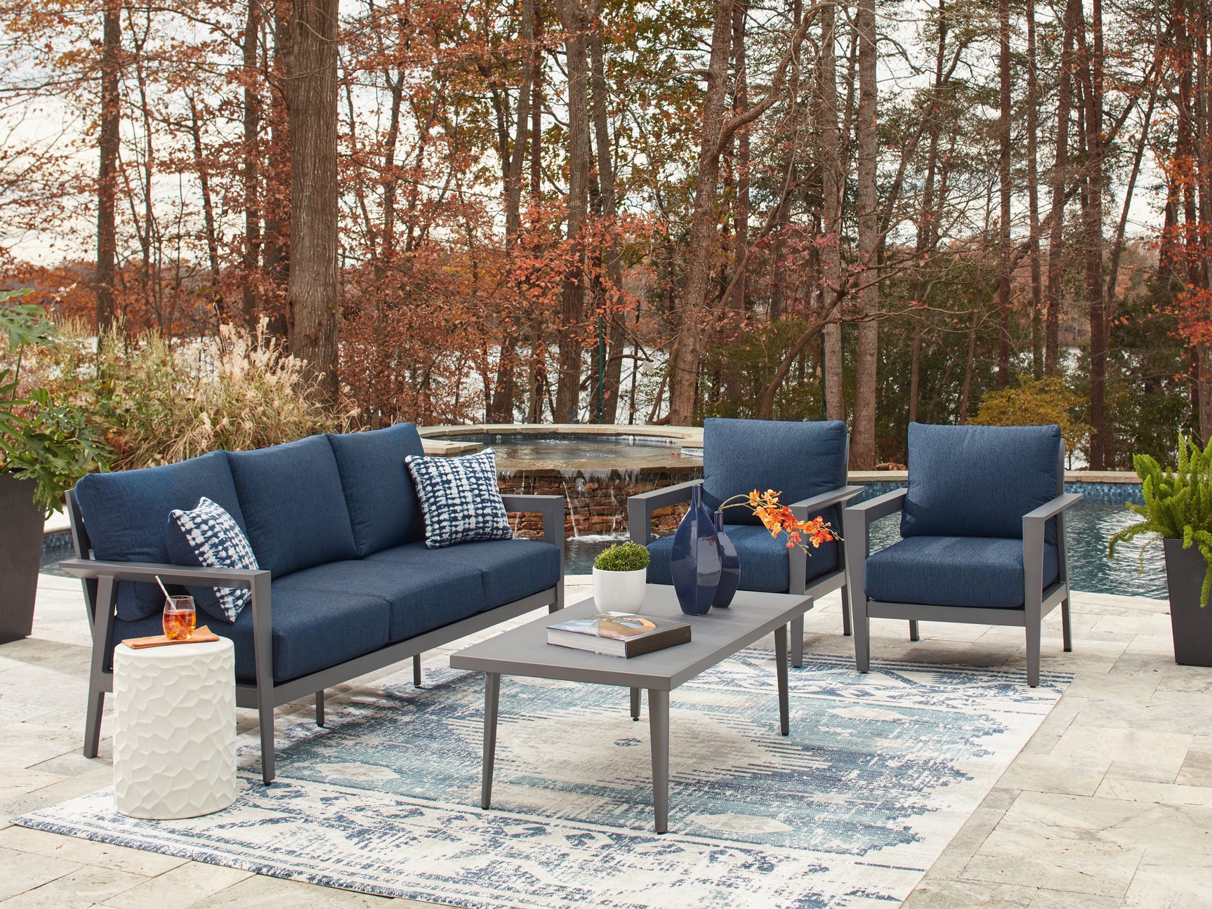 Gali sofa with plush blue cushions front view