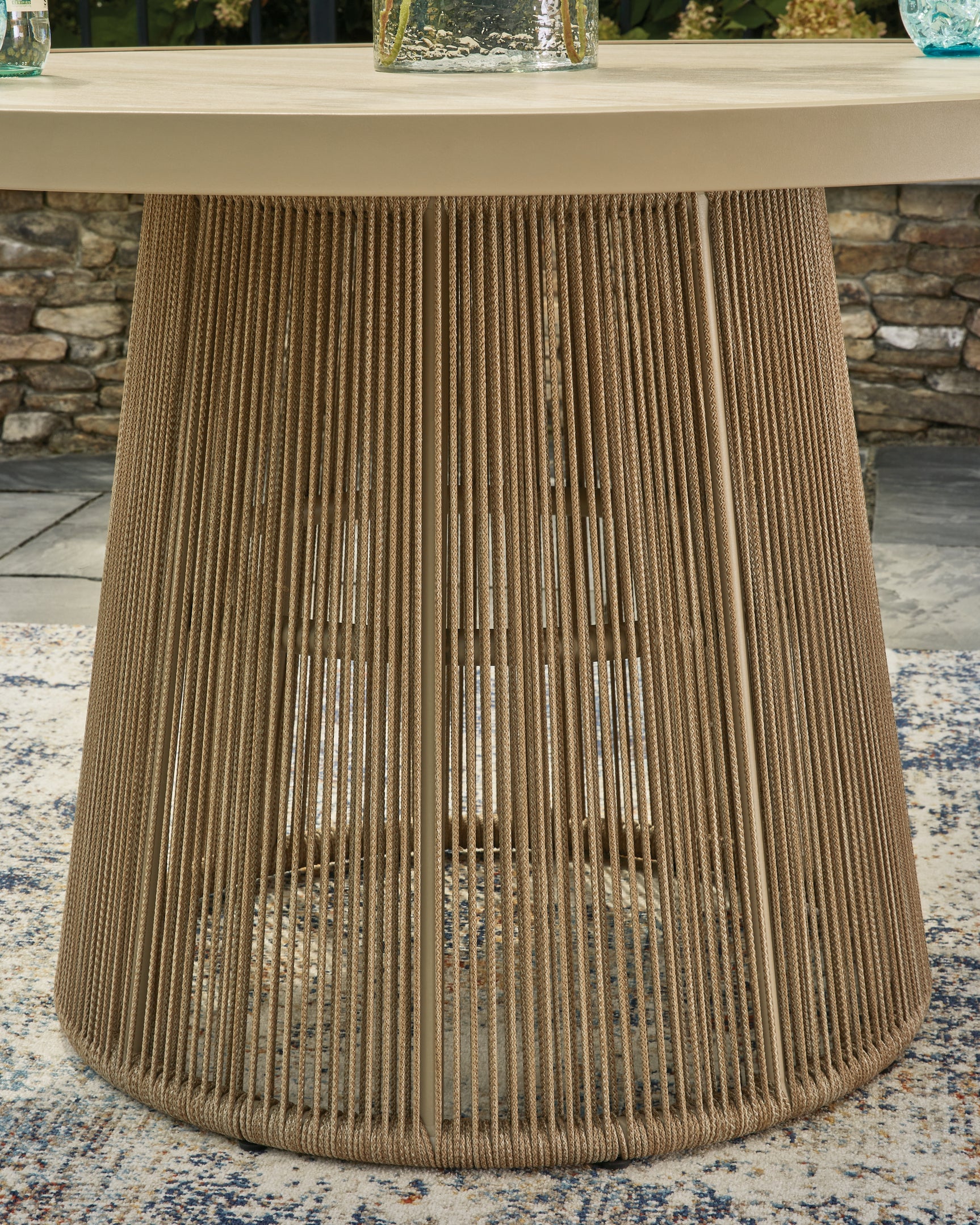 Beige polyester rope-wrapped aluminum base detail