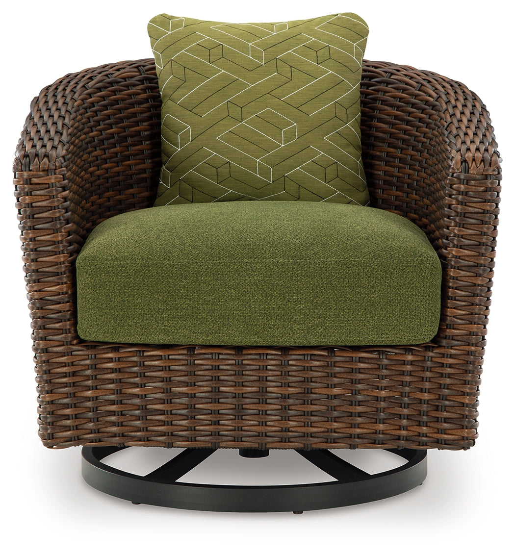 Two Horizon green cushioned chairs with brown frames, angled view