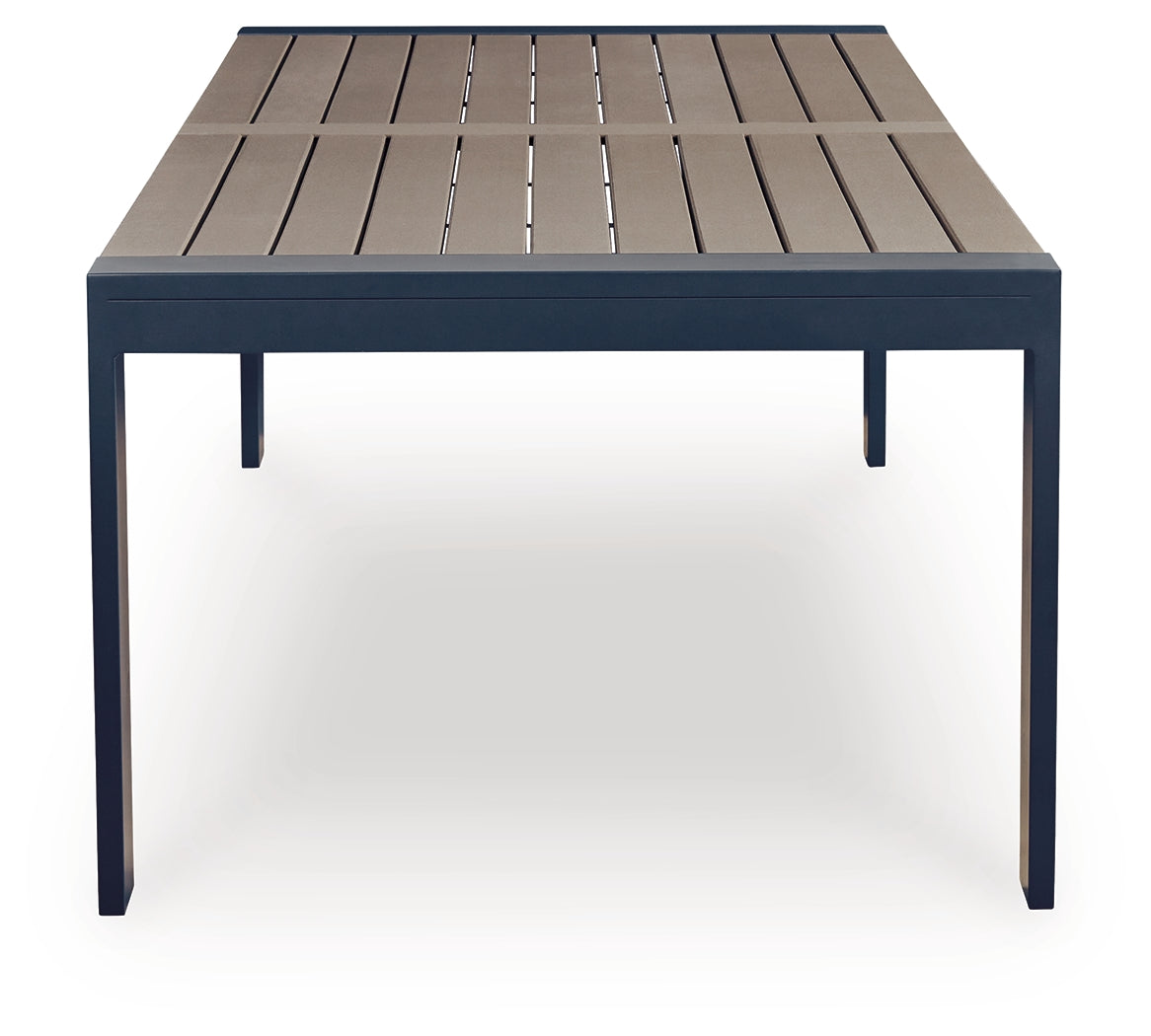Side profile displaying East Beach outdoor dining table aluminum frame and wood-look surface