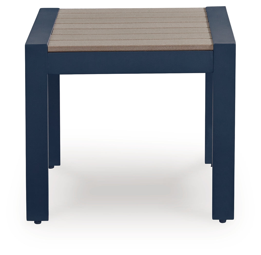 Close-up of wood-look driftwood top and navy blue aluminum frame