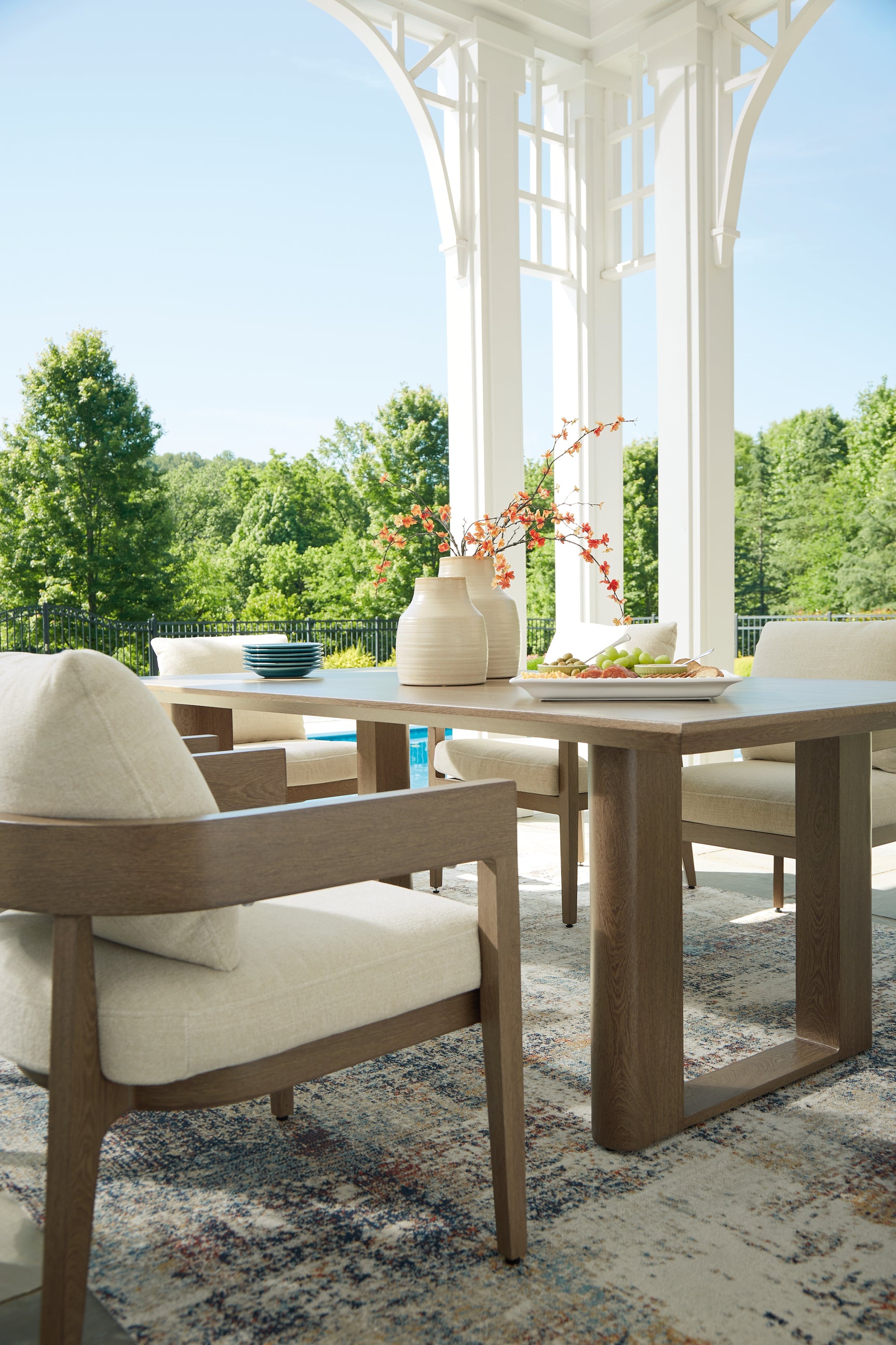 Serene Dark Brown Bay Outdoor Dining Table and 4 Cushioned Chairs