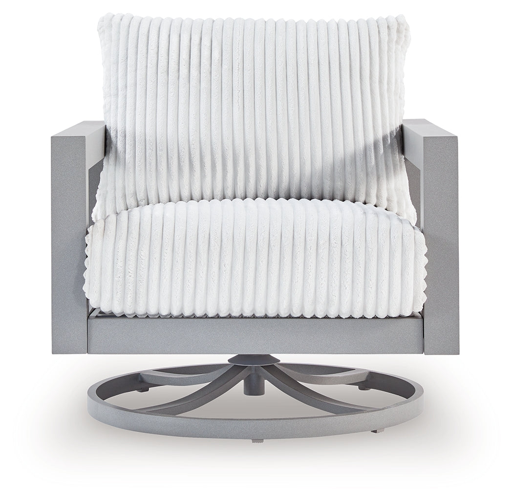 Angle view of Hurley Gray Park outdoor loveseat with lounge chairs