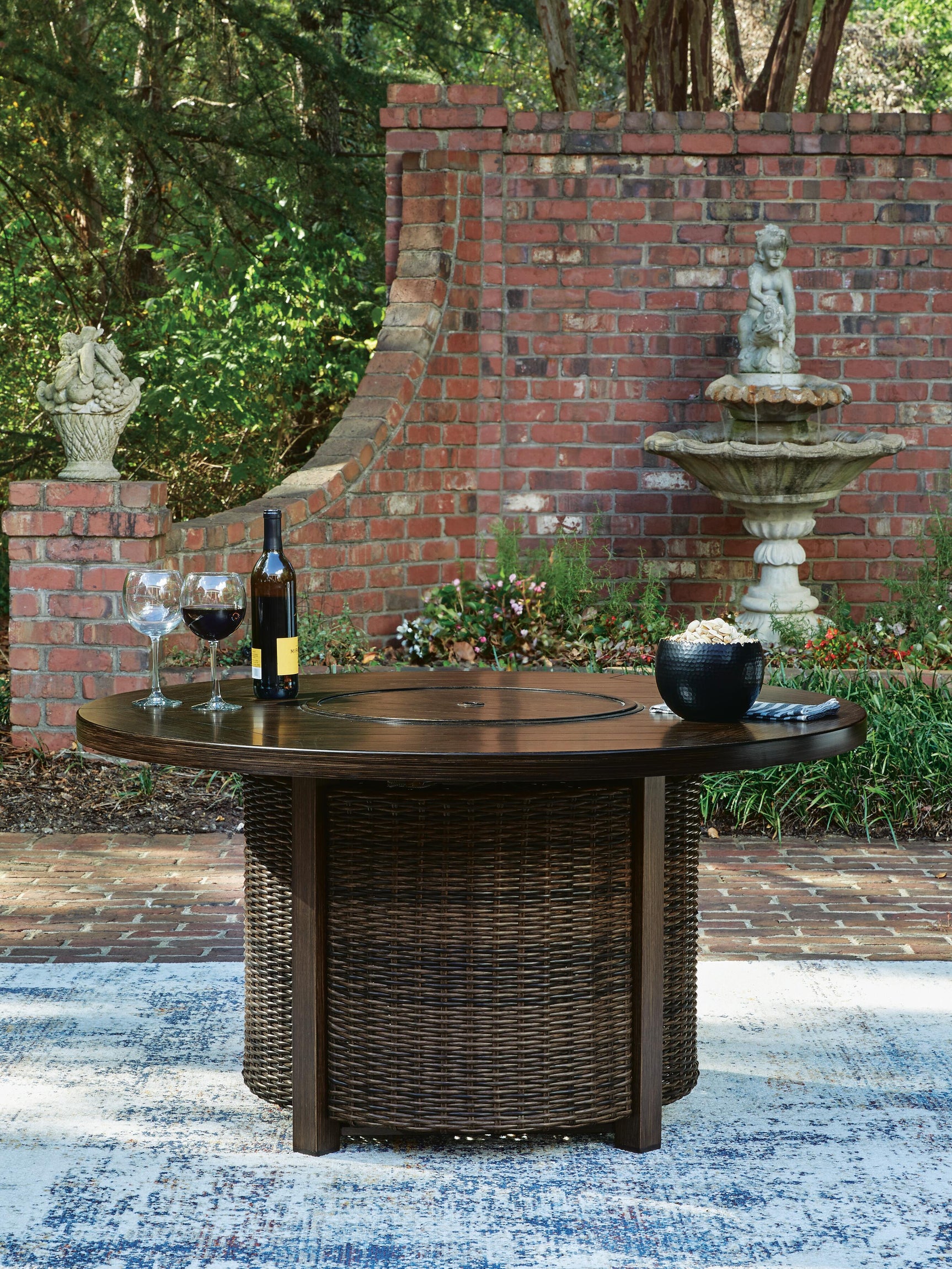 Close-up of resin wicker and aluminum tabletop