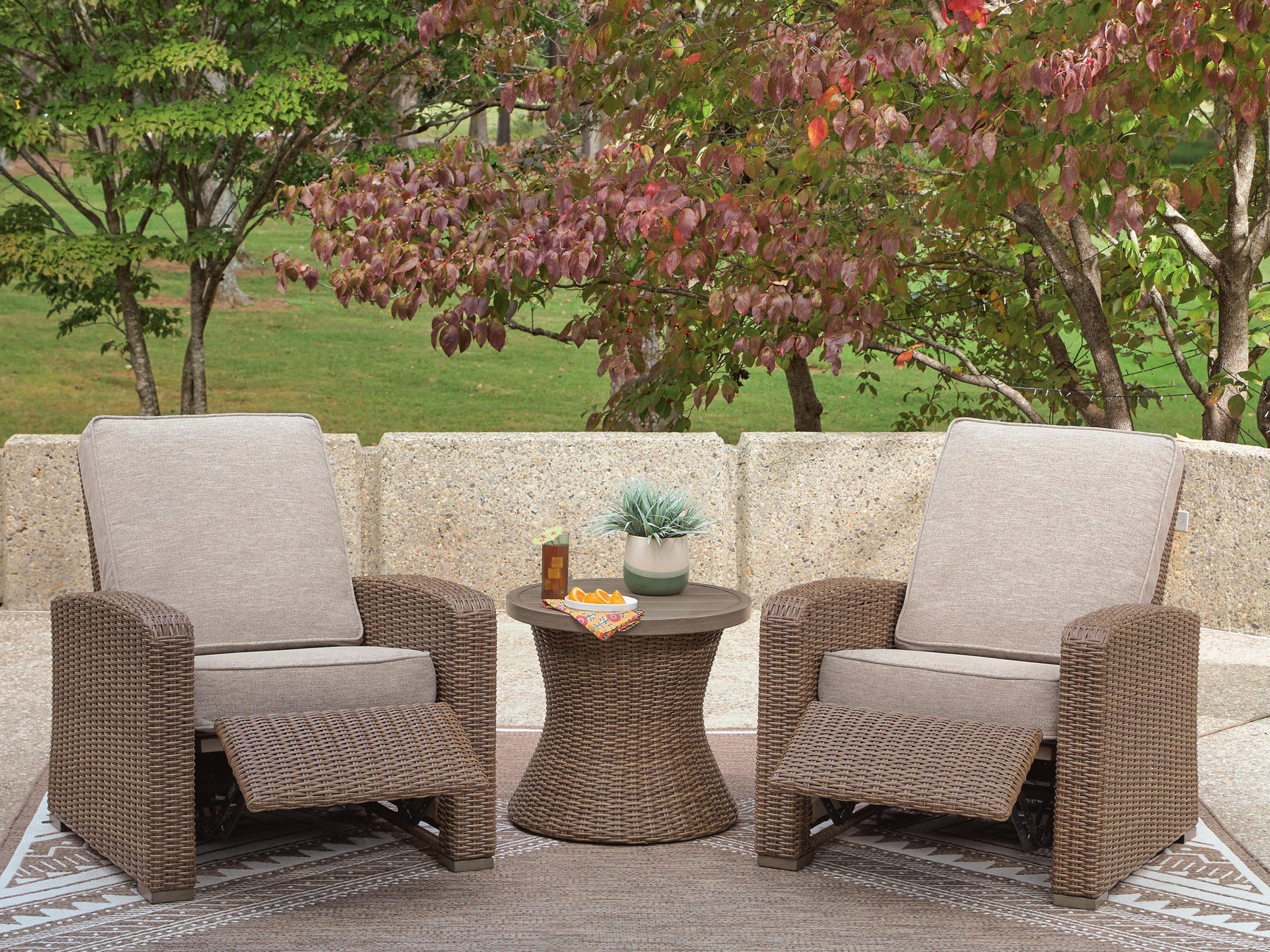 Side view of Laguna outdoor recliner with beige cushions
