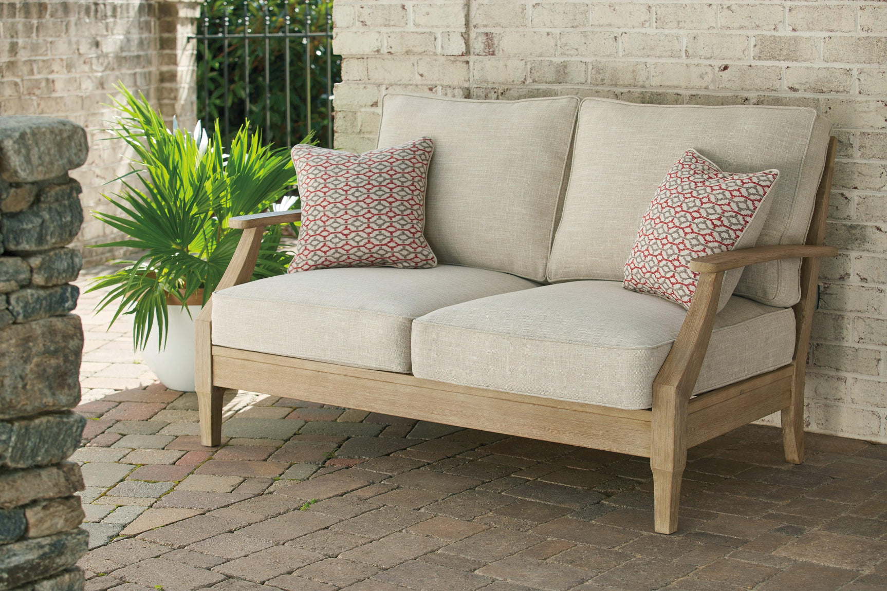 Clare View outdoor loveseat front view with cushions