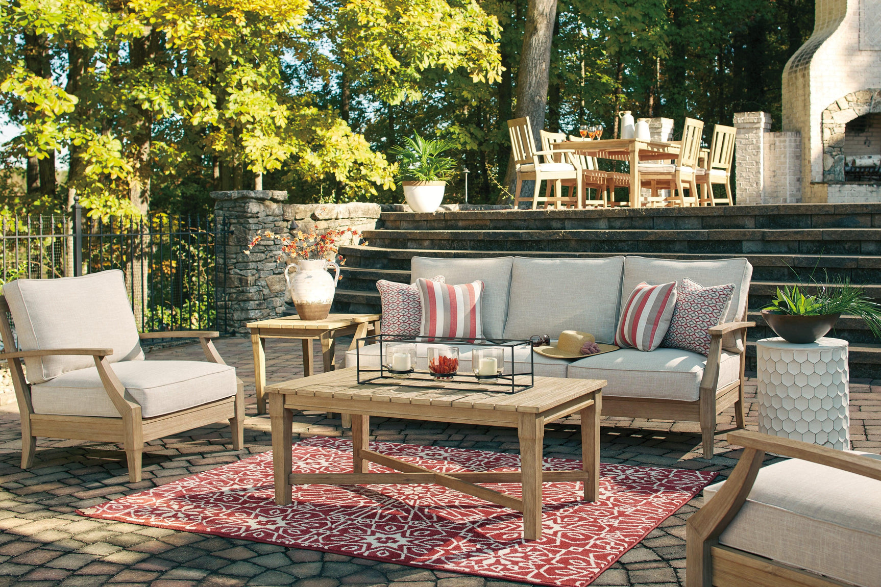 Clare View 3-Seater Sofa in beige fabric outdoor patio setup