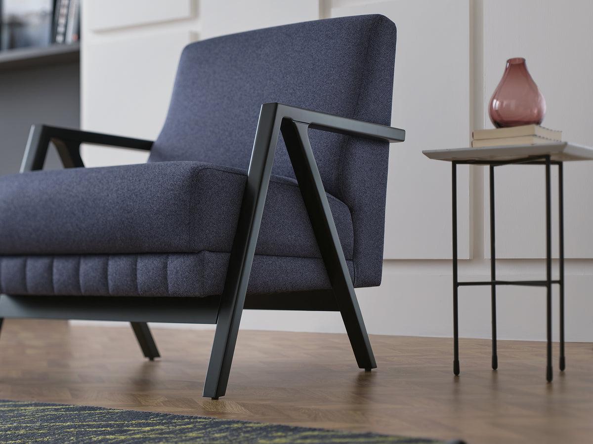 Side view of Pavia Navy Blue Armchair