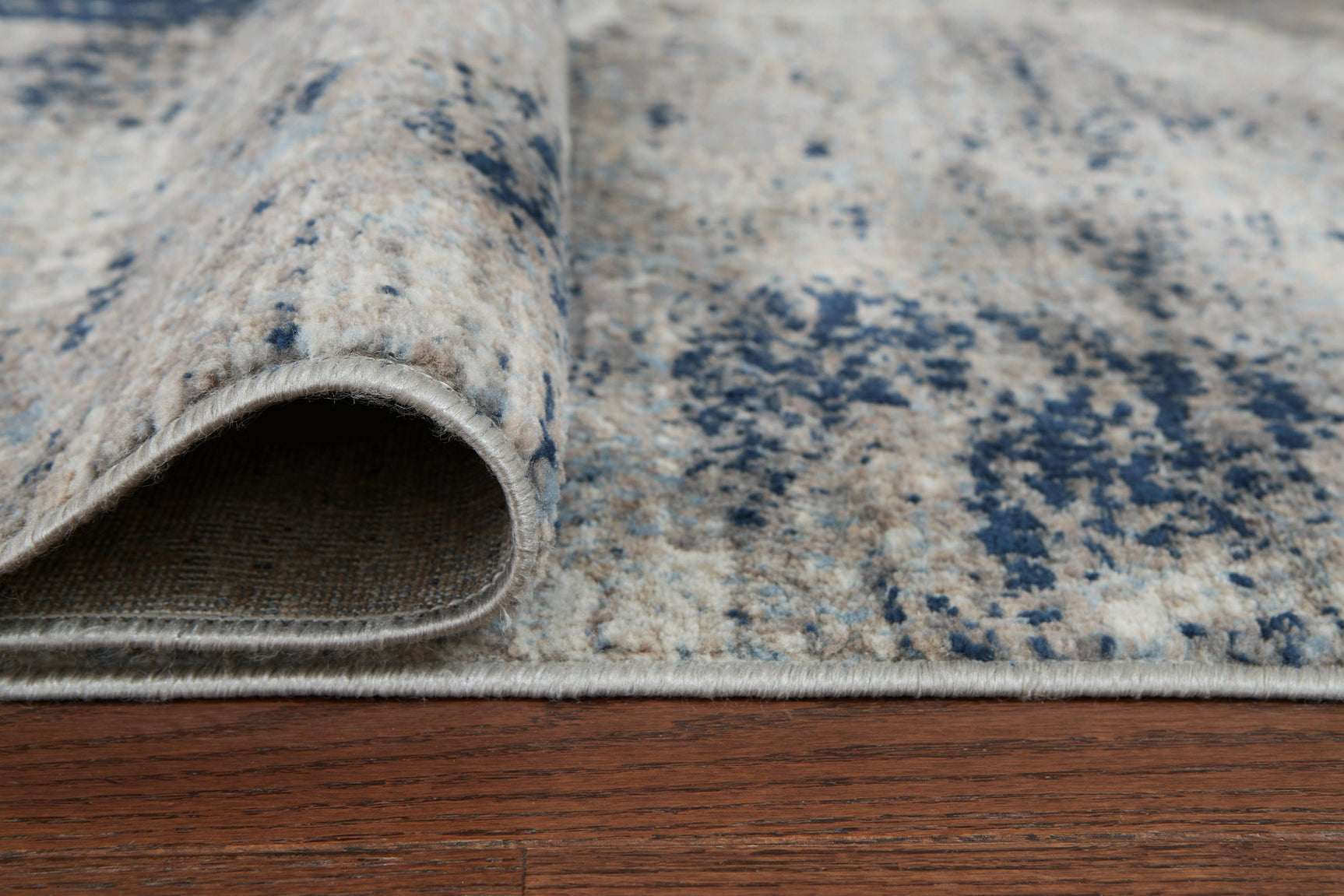 Wrenstow Multi Medium Rug rolled and detailed texture