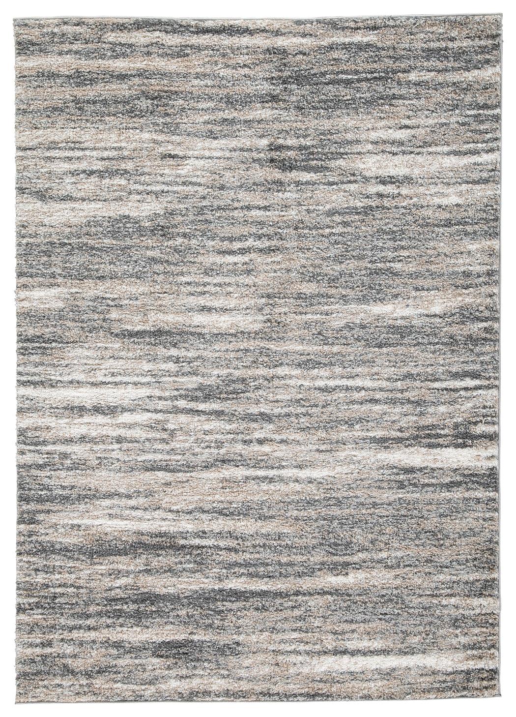 Close-up of Gizela rug's striped pattern and pile