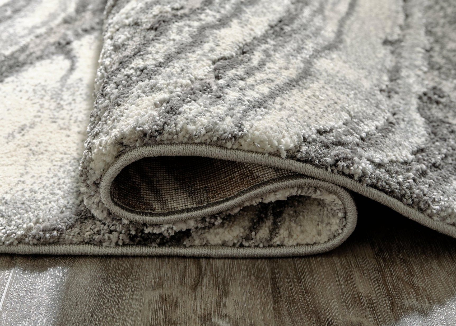 Rolled edge detail of Wysdale Ivory Gray rug