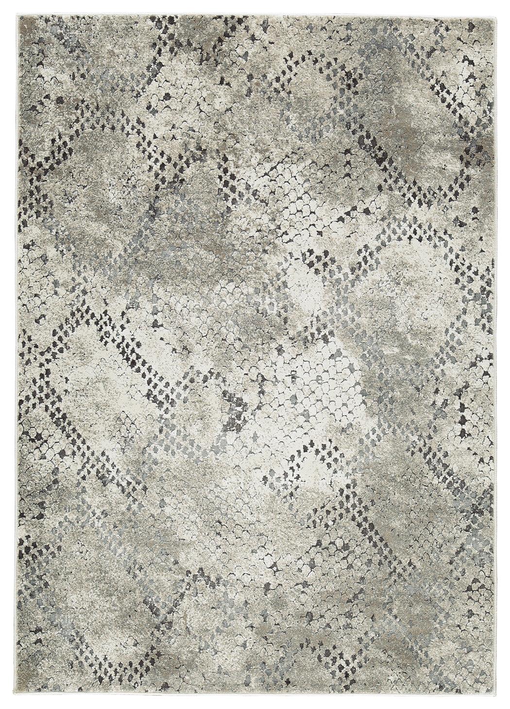 Close-up detail of Poincilana Multi 5' x 7' Rug texture
