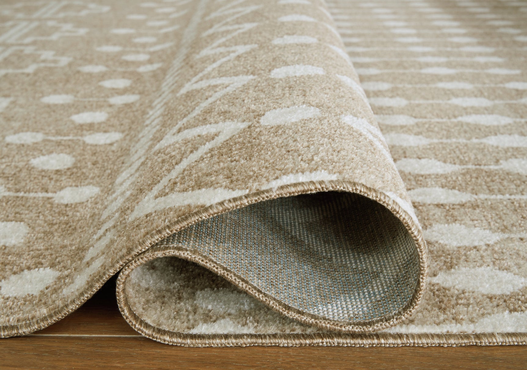 Rolled Bunchly rug highlighting thickness