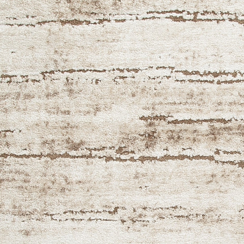 Kasney Rug sample swatch highlighting cream and brown colors