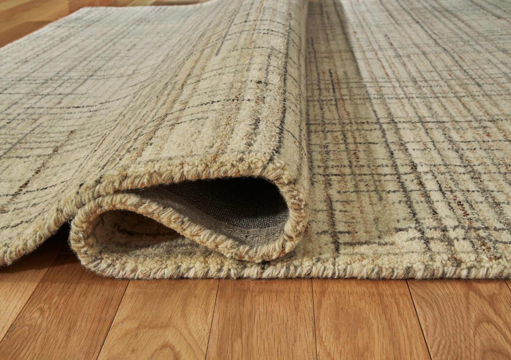 Rolled Janston rug displaying fabric texture