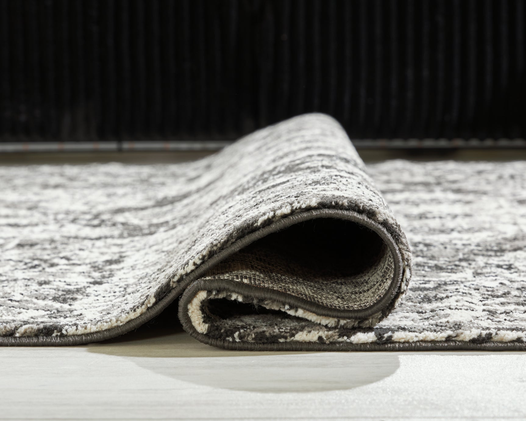 Detail of Glennisman large rug weaving and pile