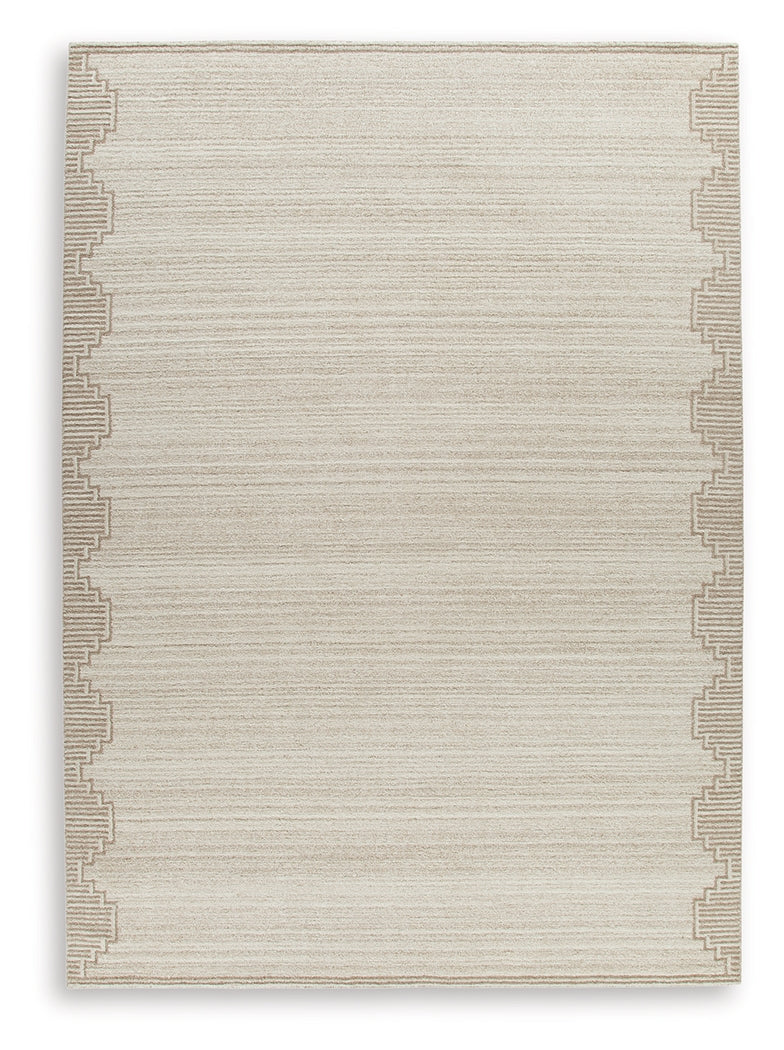 Close-up detail of the Emorymore rug's stepped border pattern