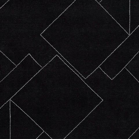 Swatch showing Marav rug's black and white colors and fiber