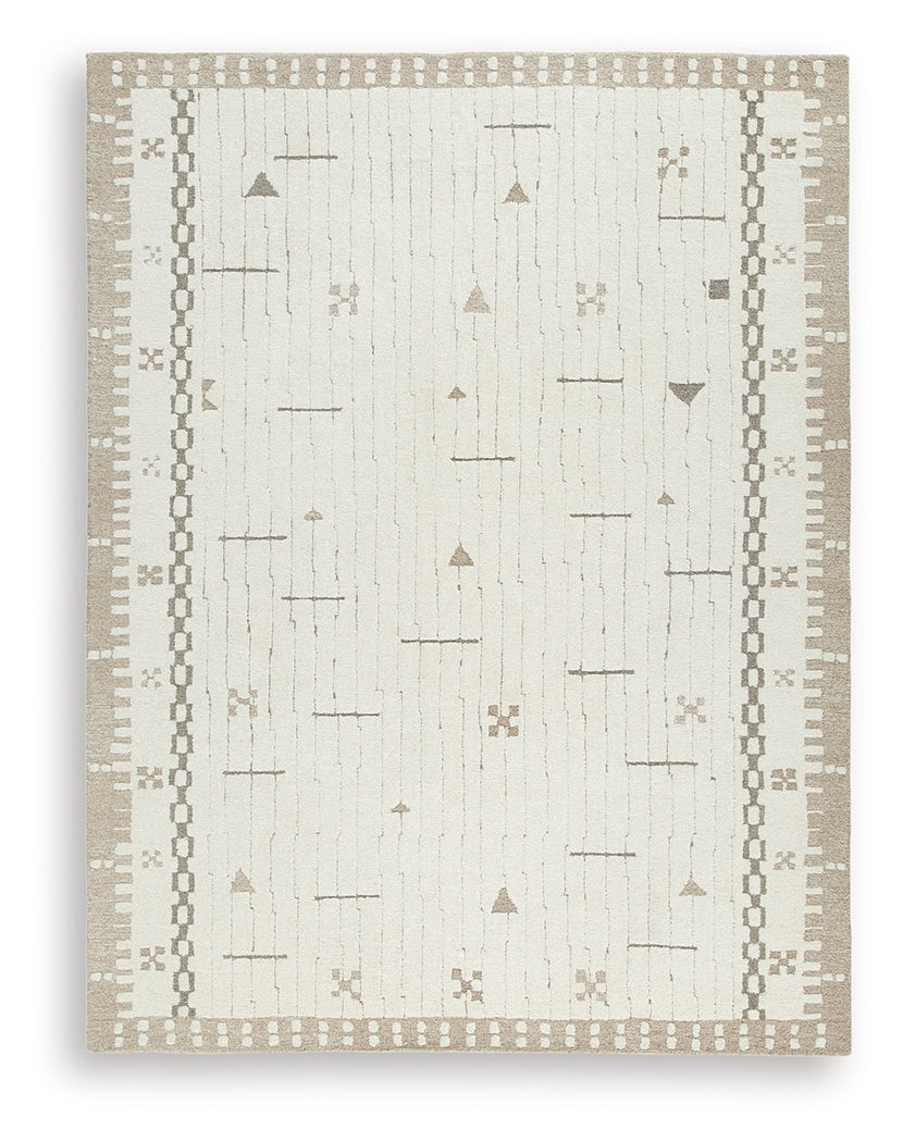 Close-up detail of hand-tufted wool texture on Dot area rug