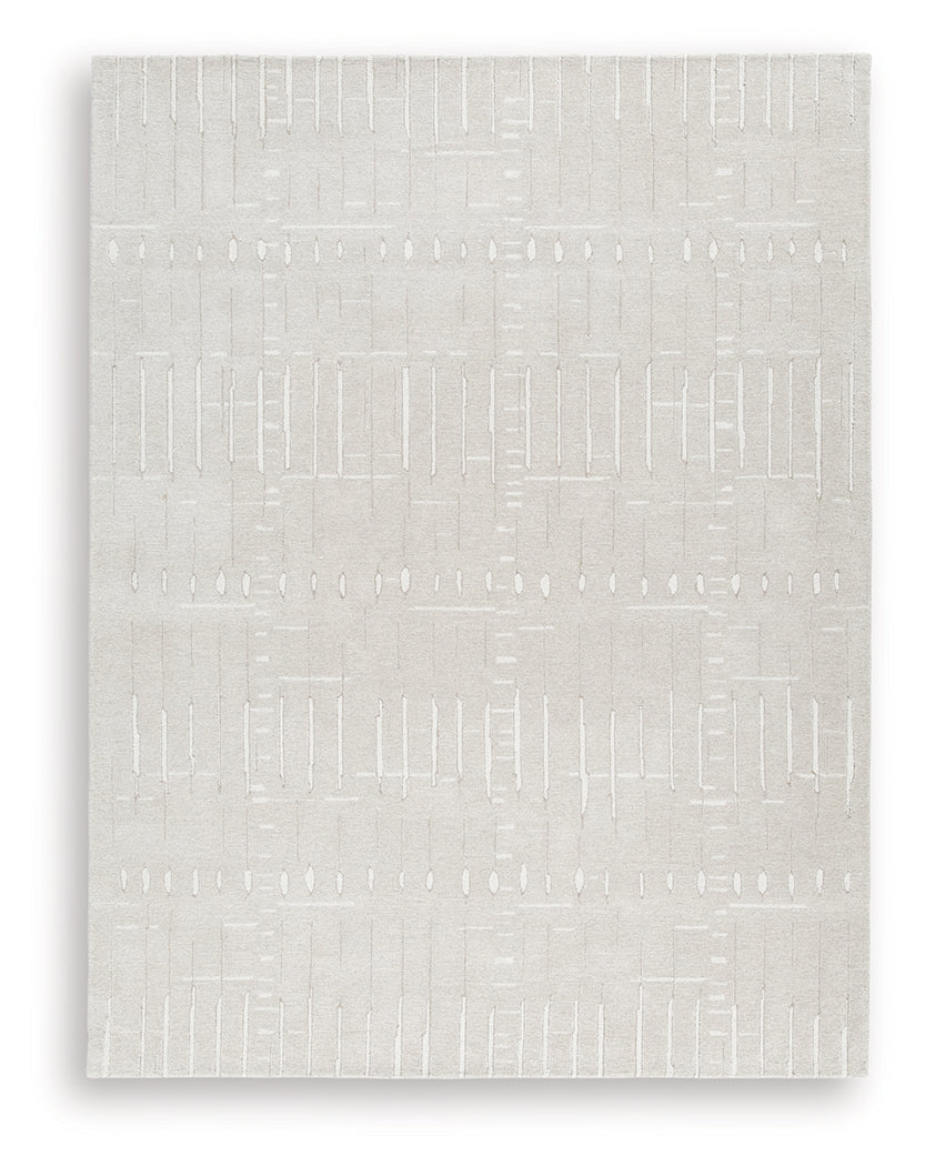 Wolbert rug rolled to show the texture and pile