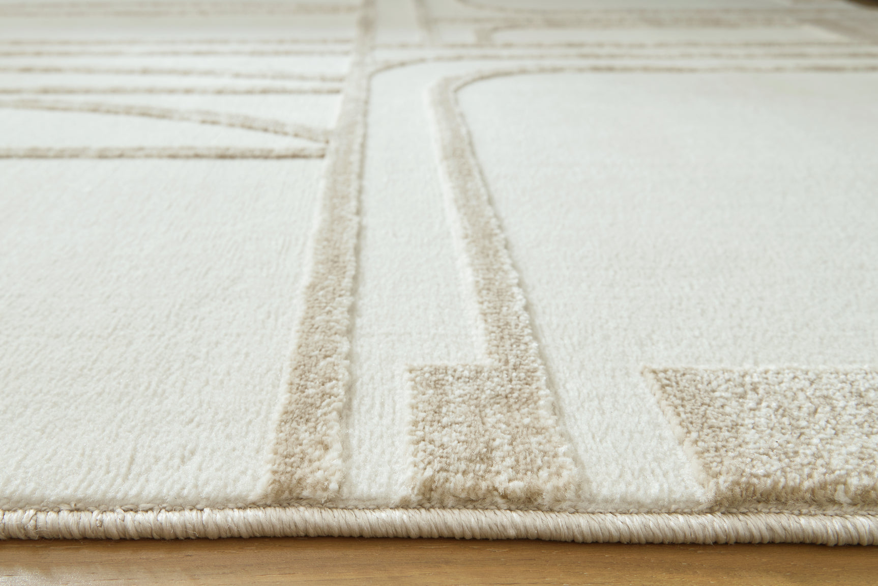 Farongrove Ivory/Beige 5'3" x 7' Area Rug