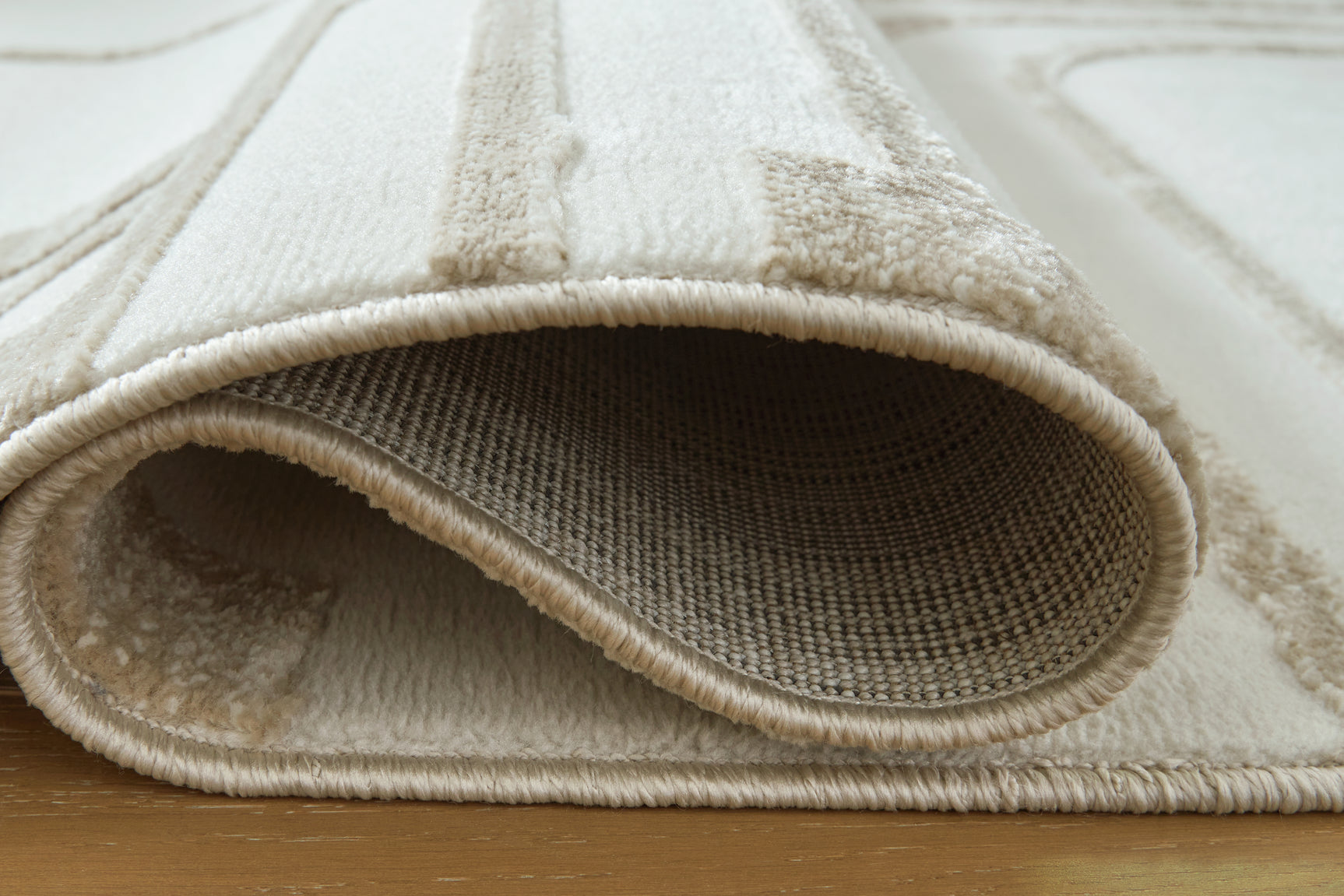 Farongrove Ivory/Beige 5'3" x 7' Area Rug