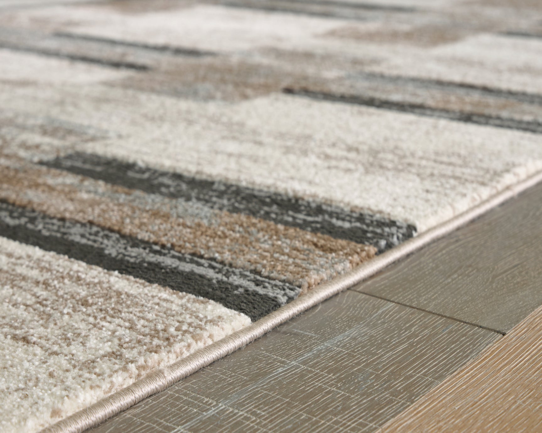 Rolled edge detail of Alstone area rug